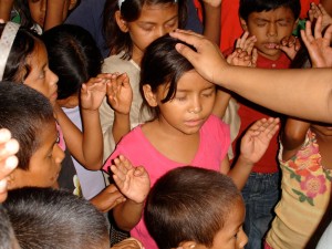 Honduran children receiving salvation